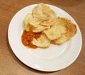 Indonesian Melinjo Emping with sambal chili sauce